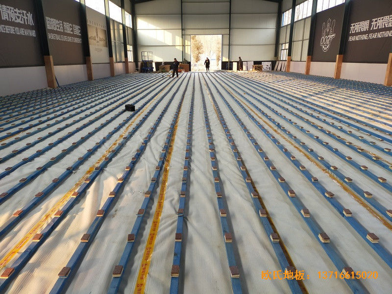 山東北環(huán)路平安行駕校籃球館運(yùn)動(dòng)木地板鋪設(shè)案例1